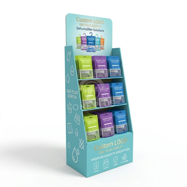 Floor-standing corrugated cardboard display stand for hanging dehumidifier bags in retail stores